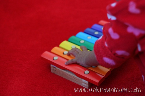 Baby-size-xylophone Baby hand on xylophone