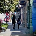 Couple_walking_down_the_street_in_San_Francisco-unknownmami